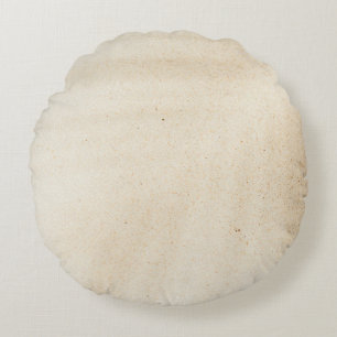 White textile with black shadow round cushion