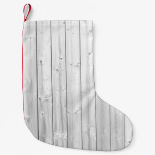 White texture wood surface small christmas stocking
