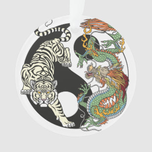 White tiger versus green dragon in the yin yang ornament