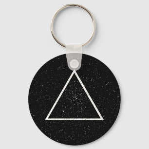 White triangle outline on black star background key ring