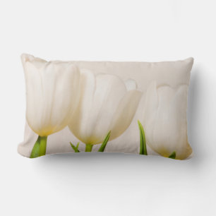 White tulips against a white background, lumbar cushion