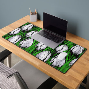 White tulips with green leaves desk mat