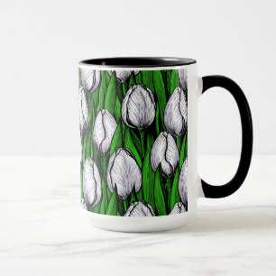 White tulips with green leaves mug