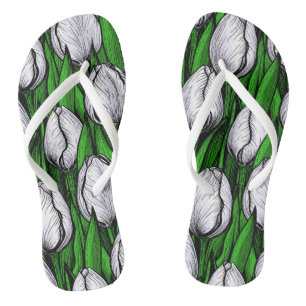 White tulips with green leaves thongs