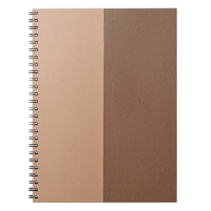 White wall paint beside white wall notebook