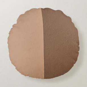 White wall paint beside white wall round cushion