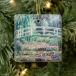 White Water Lilies | Claude Monet Ceramic Ornament<br><div class="desc">White Water Lilies (1899) | Claude Monet’s White Water Lilies is a serene and captivating painting from his iconic Water Lilies series. This work depicts a tranquil pond adorned with delicate white lily blossoms and green lily pads floating on its reflective surface. Monet's impressionist style shines through in the soft,...</div>