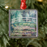 White Water Lilies | Claude Monet Metal Ornament<br><div class="desc">White Water Lilies (1899) | Claude Monet’s White Water Lilies is a serene and captivating painting from his iconic Water Lilies series. This work depicts a tranquil pond adorned with delicate white lily blossoms and green lily pads floating on its reflective surface. Monet's impressionist style shines through in the soft,...</div>