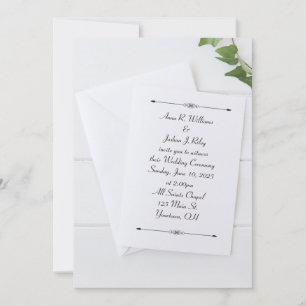 white wedding invitation with envelope with ivy
