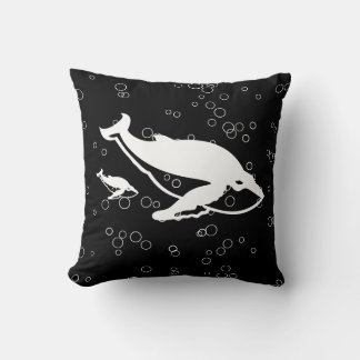 white whales and buble on black pillow