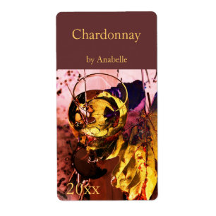 White wine glass and grape leaf wine bottle label