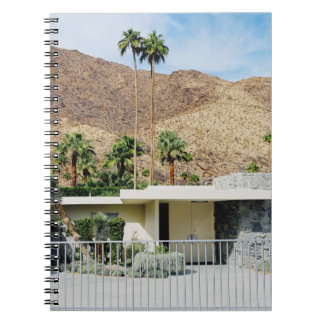 WHITE WOODEN FENCE NEAR GREEN PALM TREE DURING DAY NOTEBOOK