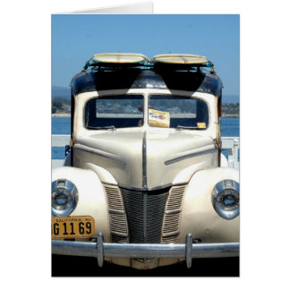 White woody with surfboards