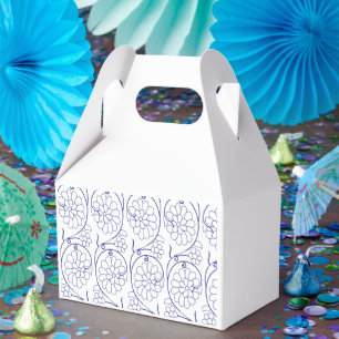 White wrapping paper with a subtle, repeating patt favour box
