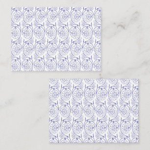 White wrapping paper with a subtle, repeating patt place card