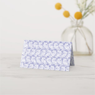 White wrapping paper with a subtle, repeating patt place card