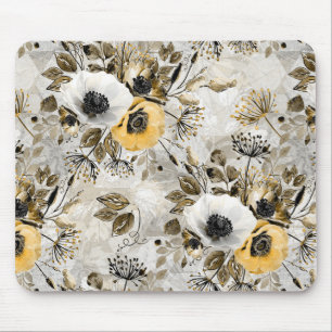 White, yellow anemones on a grey-brown background. mouse pad