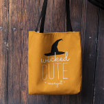 Wicked Cute Personalised Halloween Tote Bag<br><div class="desc">Send your little trick-or-treater out with this adorable personalised bag in festive Halloween orange,  featuring "wicked cute" in white topped with a black witch's hat illustration. Personalise with a name in white modern script lettering.</div>