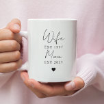 Wife Mum EST Year Mug | Minimalist Custom Family<br><div class="desc">Celebrate every chapter of her journey with this elegant minimalist mug featuring the titles Wife and Mum with personalised EST years. A beautiful keepsake for anniversaries, new moms, or just because, this custom mug is perfect for daily coffee moments filled with love and meaning. Simple, modern typography on a clean...</div>