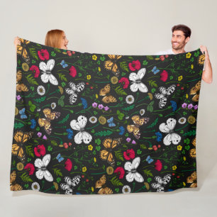 Wild flowers and butterflies on black fleece blanket
