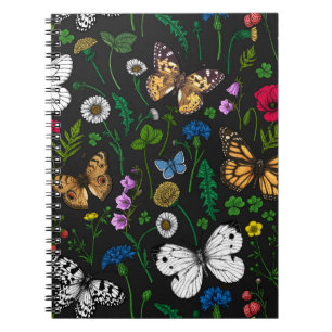 Wild flowers and butterflies on black notebook