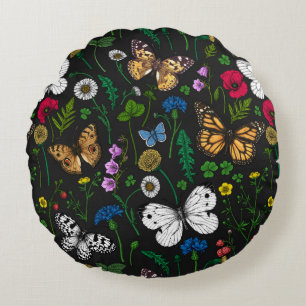 Wild flowers and butterflies on black round cushion