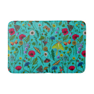 Wild flowers and moths on teal bath mat