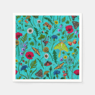 Wild flowers and moths on teal napkin
