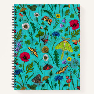 Wild flowers and moths on teal notebook