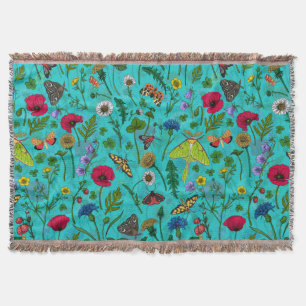 Wild flowers and moths on teal throw blanket