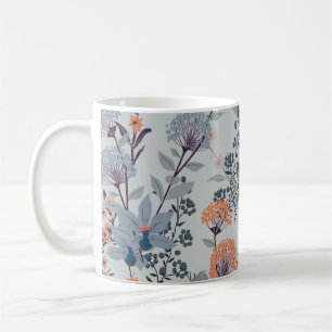 Wild flowers on blue, botanical pattern. coffee mug