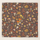 Wild mushrooms on brown scarf<br><div class="desc">Step into a woodland wonderland with this pattern featuring an array of wild mushrooms, autumn leaves, berries, and acorns. Painted in rich autumnal colours, each element brings the essence of the forest to life, showcasing nature's diversity and charm.</div>