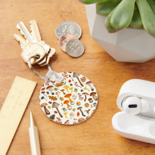 Wild mushrooms on off white key ring