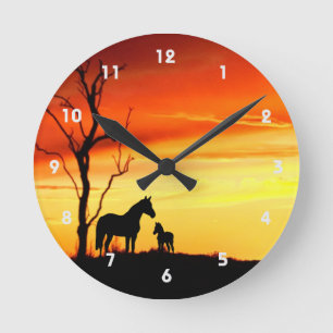 Wild Mustang Mare and Foal Silhouette With Sunset Round Clock