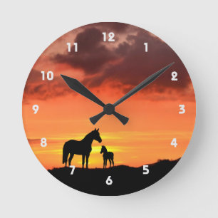 Wild Mustang Mare and Foal Silhouette With Sunset Round Clock