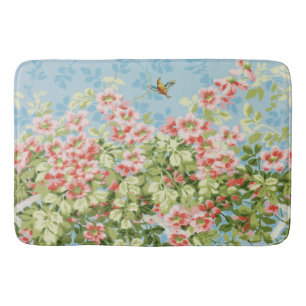 WILD ROSES ,GREEN LEAVES ,FLYING BIRD IN BLUE SKY BATH MAT