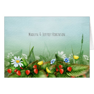 Wild strawberries in a meadow blue sky country