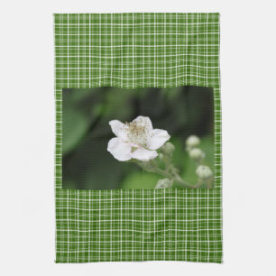 Wild white raspberry flower. tea towel