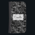Wildflower damask black white cell flap wallet<br><div class="desc">Stylish modern wildflower damask patterned graphic cell phone flap wallet case. Customise the with your name and one monogram initial,  currently reads Camille R. Original pattern and design by Sarah Trett.</div>