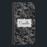 Wildflower damask black white cell flap wallet<br><div class="desc">Stylish modern wildflower damask patterned graphic cell phone flap wallet case. Customise the with your name and one monogram initial,  currently reads Camille R. Original pattern and design by Sarah Trett.</div>