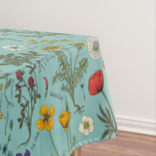 Wildflowers collage on blue tablecloth