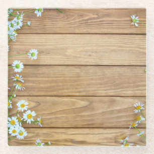 Wildflowers, herbs: wooden background. glass coaster
