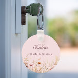 Wildflowers pink beige monogram key ring<br><div class="desc">Add a touch of personal charm to your daily routine with our Personalised Floral Keychain. Featuring a delightful pink background decorated with wildflowers from a summer meadow, this keychain is as beautiful as it is practical. Perfect for keeping your keys organised while adding a personal touch to your space. Beautiful...</div>