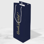 Will You Be My Bridesmaid? Modern Proposal Wine Gift Bag<br><div class="desc">"Will You Be My Bridesmaid?" Modern Proposal Gift bag
features title "Will You Be My Bridesmaid?" in gold modern script font style on navy blue background.

Please Note: The foil details are simulated in the artwork. No actual foil will be used in the making of this product.</div>
