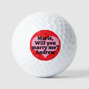 Will You Marry Me? Pink Heart and Red Background Golf Balls