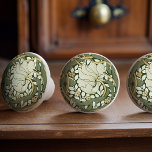 William Morris Pimpernel Vintage Pattern Ceramic K Ceramic Knob<br><div class="desc">William Morris Pimpernel Floral Vintage Art Wallpaper Design William Morris was an English textile designer, artist, writer, and socialist associated with the Pre-Raphaelite Brotherhood and British Arts and Crafts Movement. He founded a design firm in partnership with the artist Edward Burne-Jones, and the poet and artist Dante Gabriel Rossetti. This...</div>