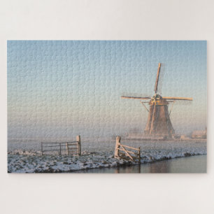 Windmill and a fence during a winter sunrise jigsaw puzzle