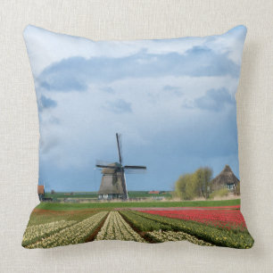 Windmill and tulips landscape throw pillow