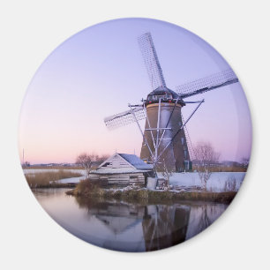 Windmill during sunrise in Holland round magnet