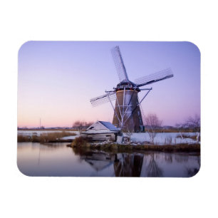 Windmill during sunrise in winter rectangle magnet